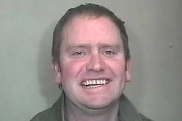 Sickening grin of pervert who is jailed for repeatedly raping teenager